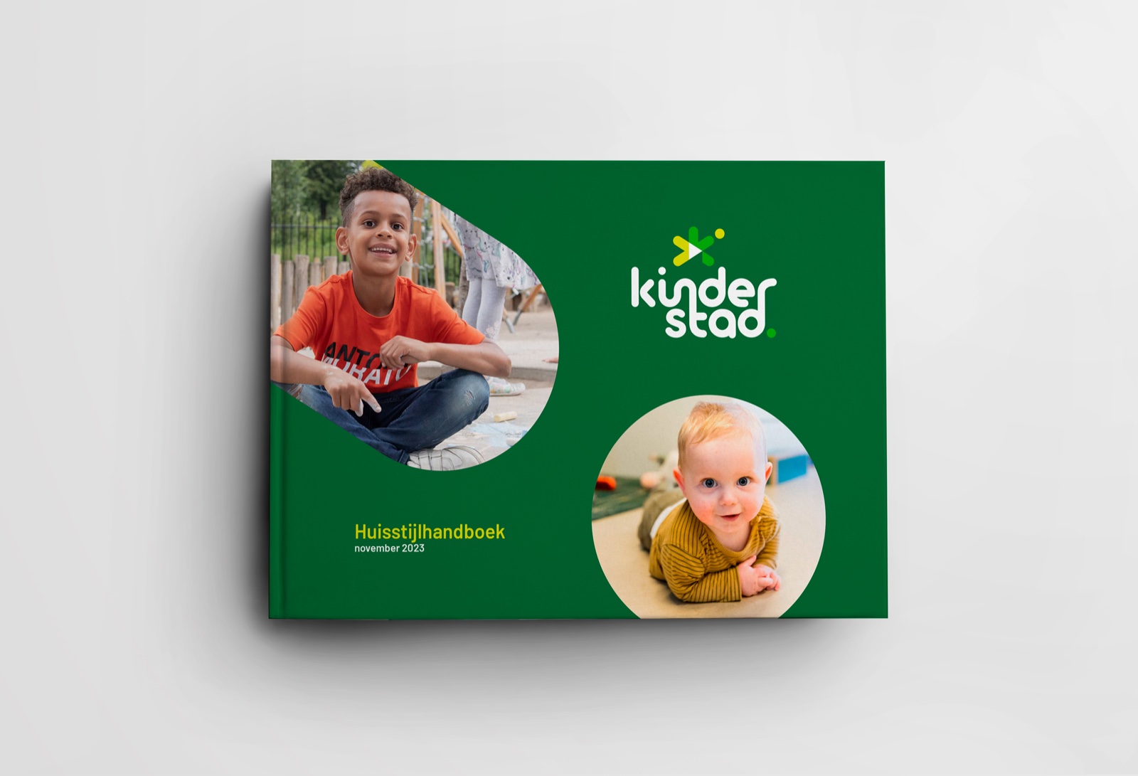 The Kinderstad brand guidelines with the new wordmark and pictorial mark.